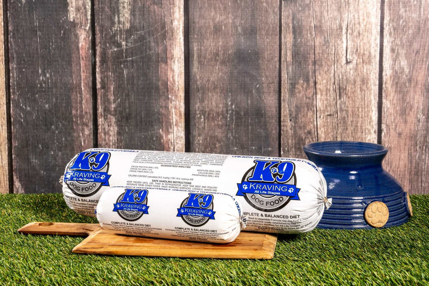 K-9 Kraving Chicken Beef & Vegetable Raw Dog Food on wooden board near dog bowl.
