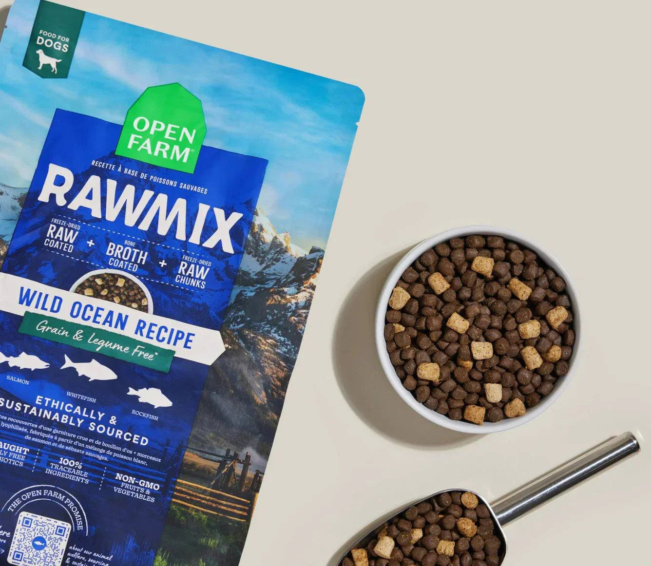 Open Farm RawMix Wild Ocean grain-free dog kibble with freeze-dried raw chunks in bowl and scoop