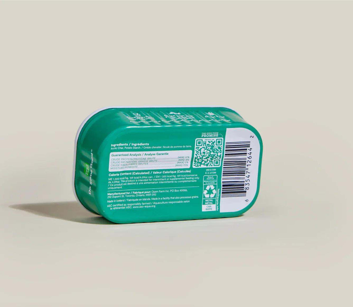 Arctic Char Topper for Dogs in a teal-green plastic tub with white labeling, QR code and barcode on the back.
