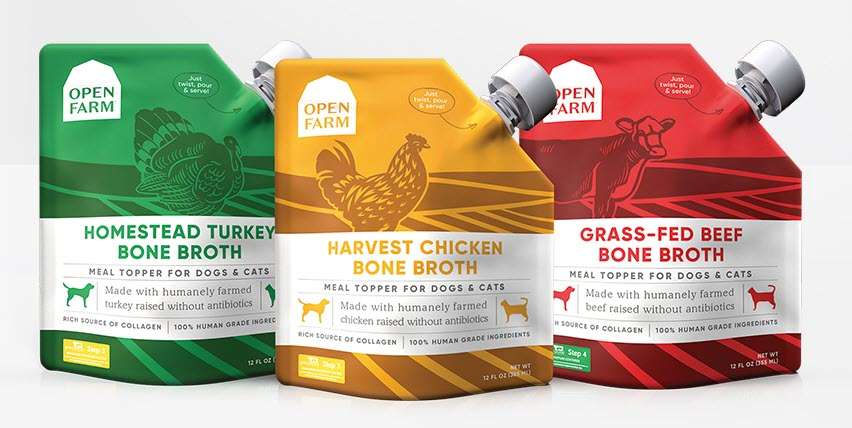 Open Farm Bone Broth for pets in three varieties: Homestead Turkey, Harvest Chicken, and Grass-Fed Beef, each formulated for nutrient-rich supplementation and flavor enhancement.