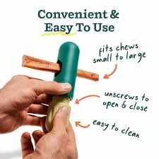 BullySafe chew holder being adjusted with hands, showcasing its fit for various chew sizes and easy-to-use design.