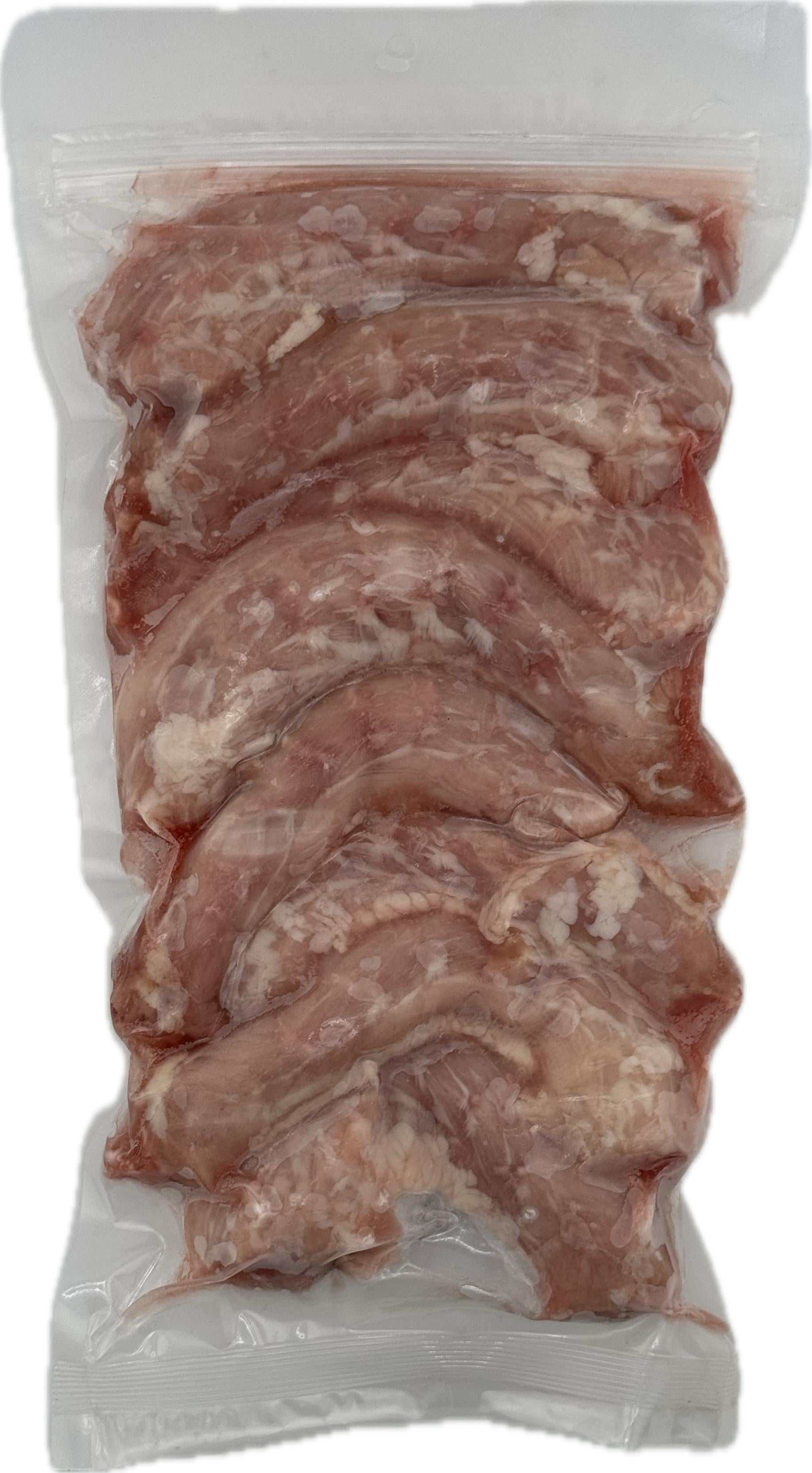 Raw chicken necks in a clear vacuum-sealed package for dogs.