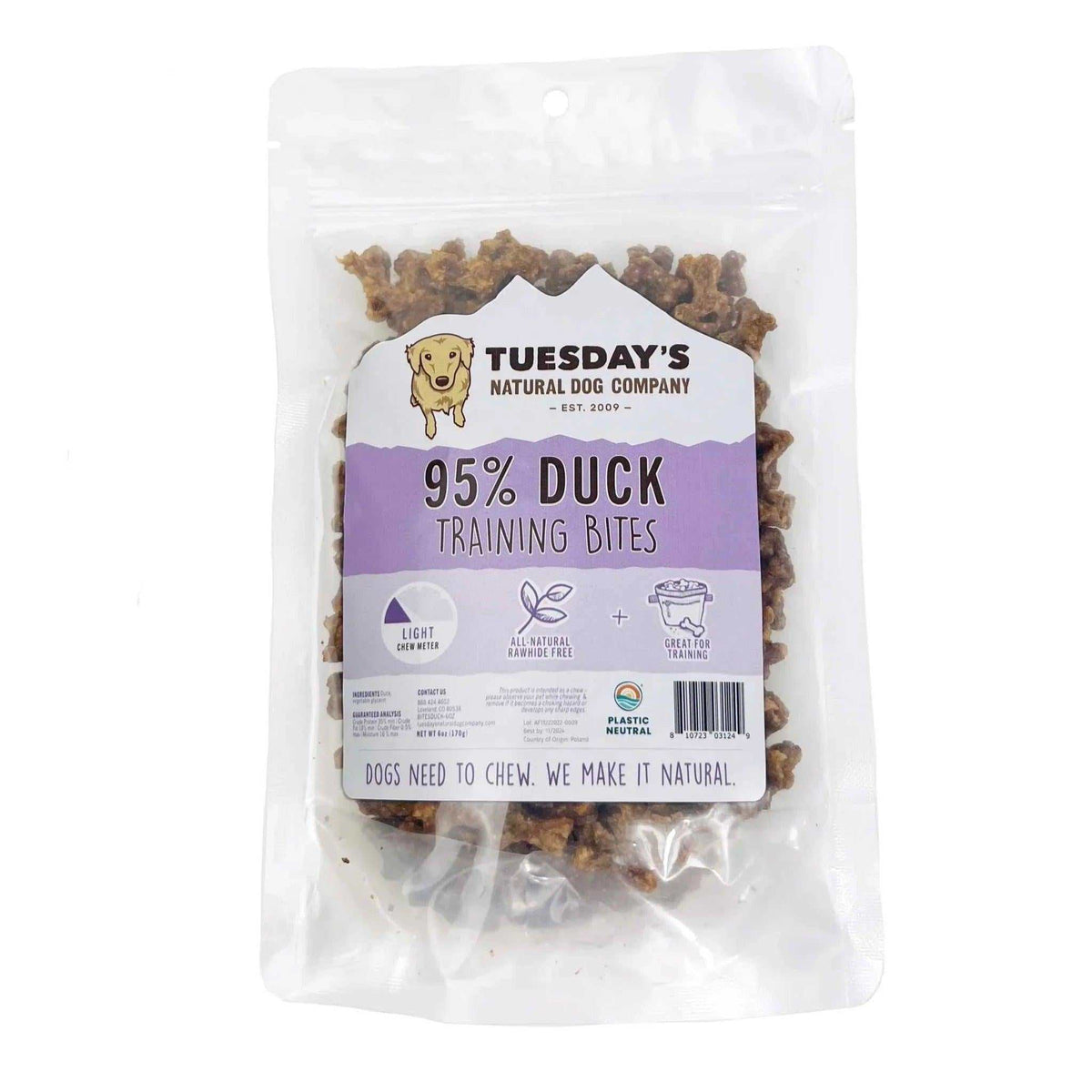Duck Training Bites in a clear resealable pouch, showing brown bite-sized treats and a purple-and-white label.