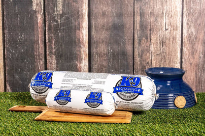 K-9 Kraving Chicken Beef & Vegetable Raw Dog Food on wooden board near dog bowl.