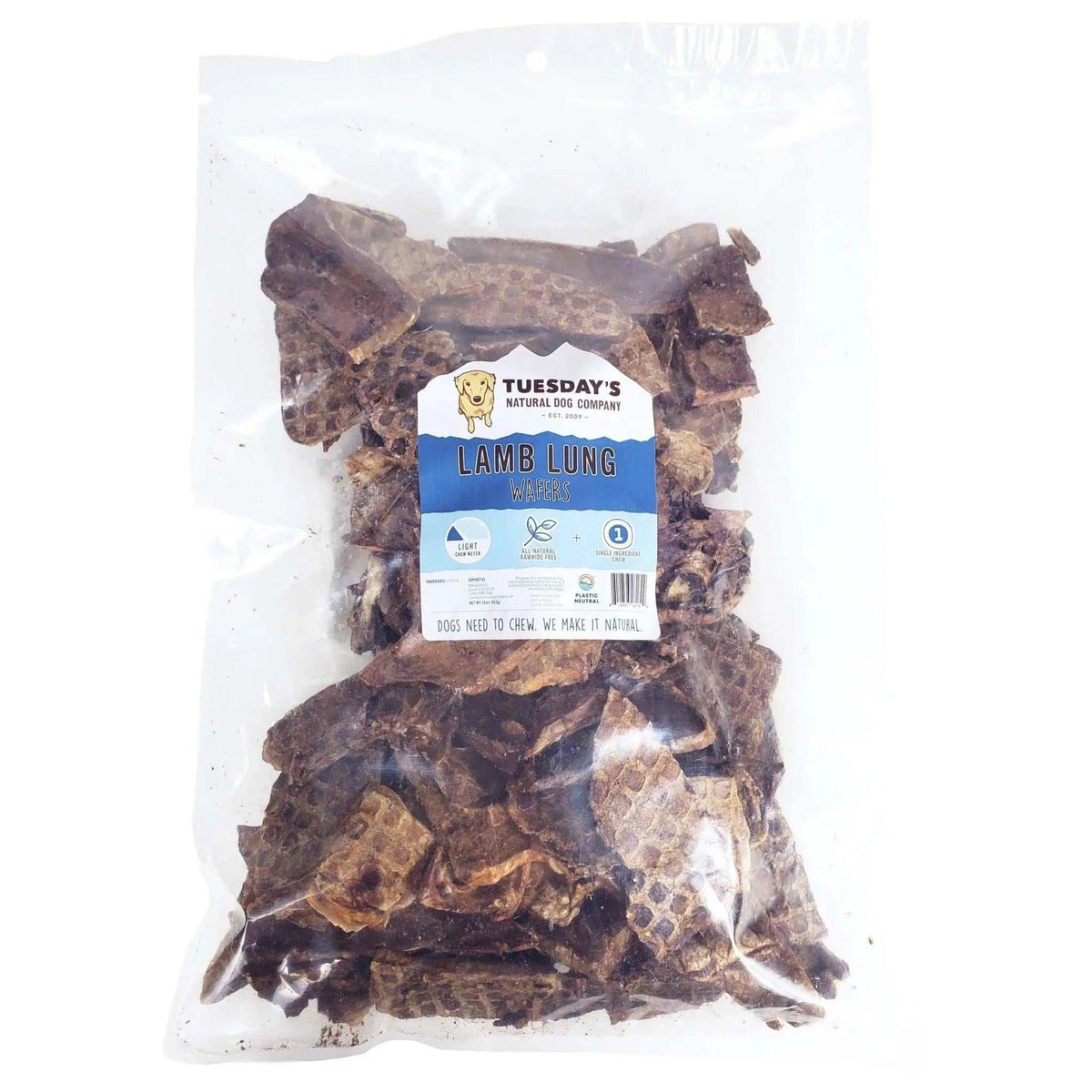 Lamb Lung Wafers in a clear bag, showing irregular, flat dark brown pieces with a rough, porous texture.