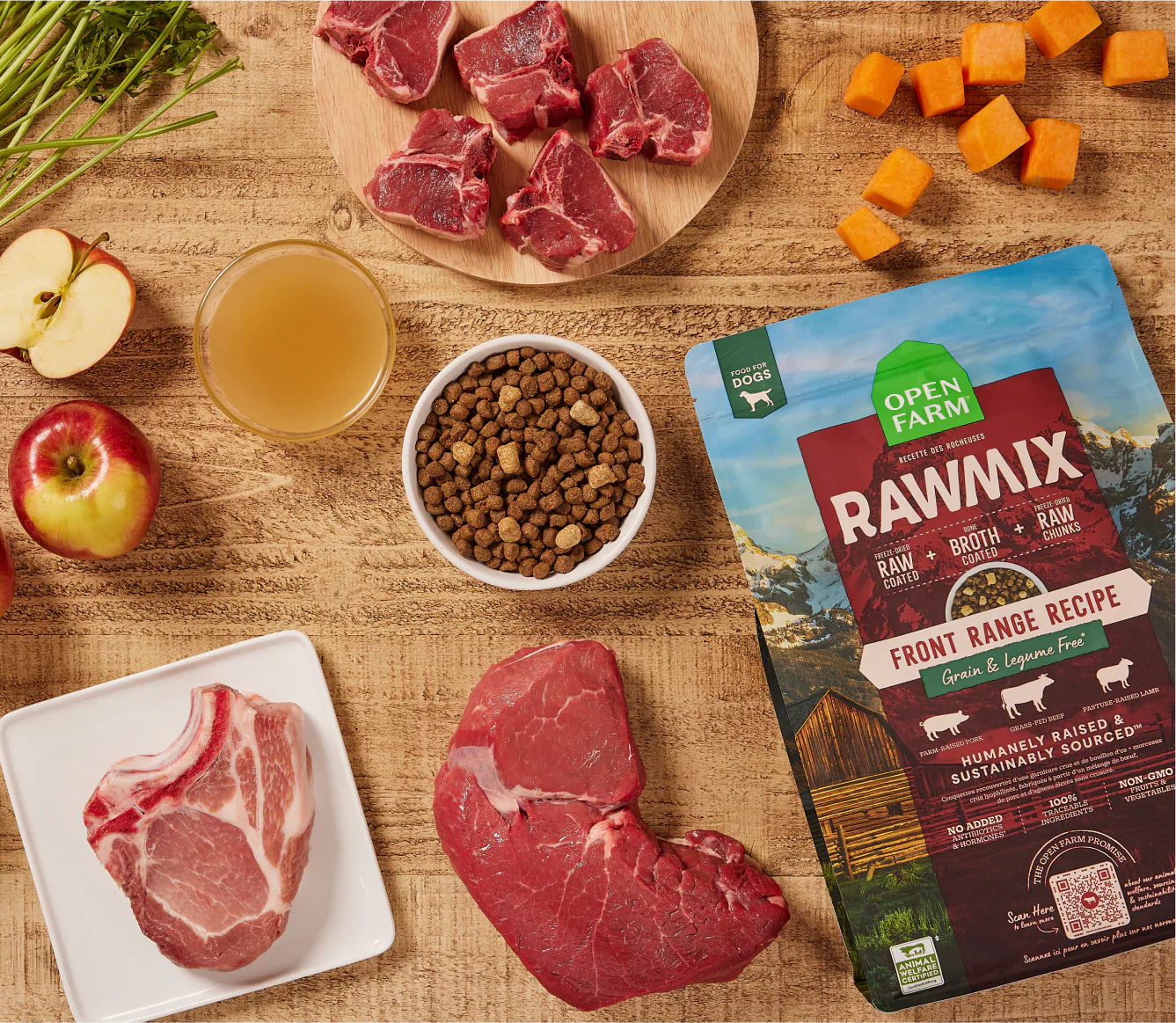 RawMix Front Range grain-free dog kibble with beef, lamb, pork, bone broth, and pumpkin ingredients displayed alongside fresh meat and vegetables