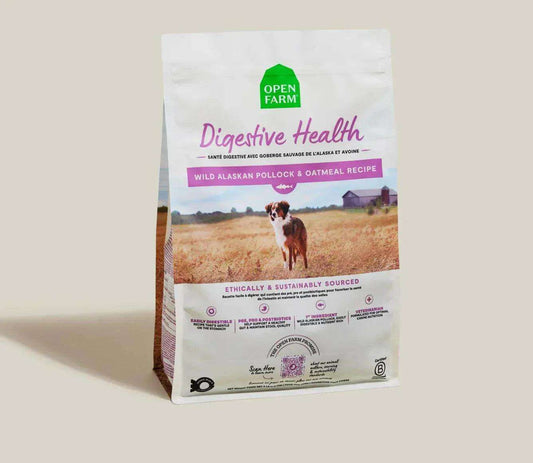 Pollock & Oatmeal Digestive Health Dog Kibble packaging featuring Wild Alaskan pollock.