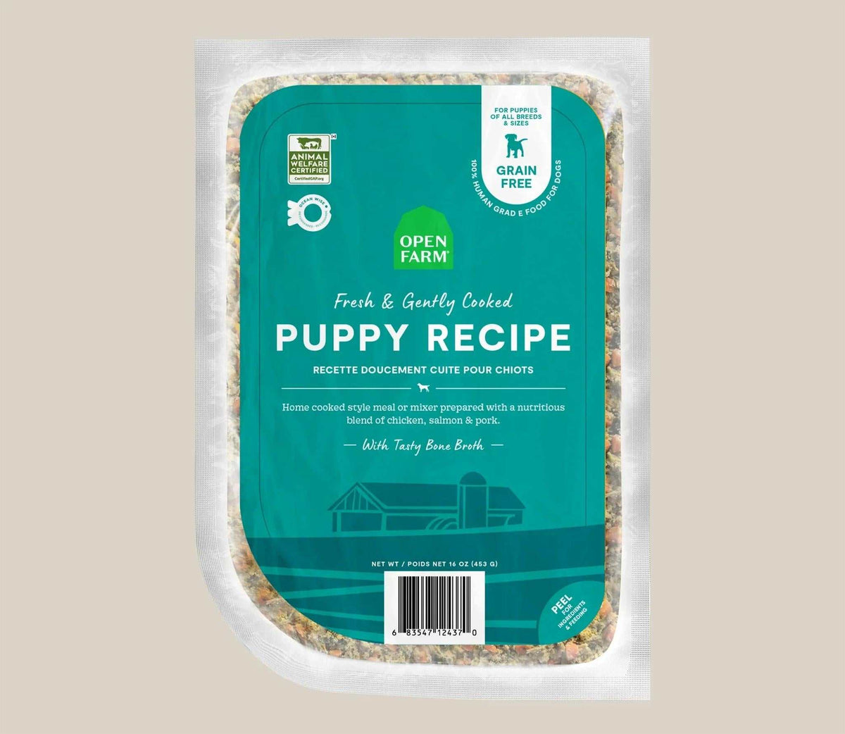 Puppy grain-free freshly cooked dog food with chicken, salmon, pork, and bone broth in a frozen pouch