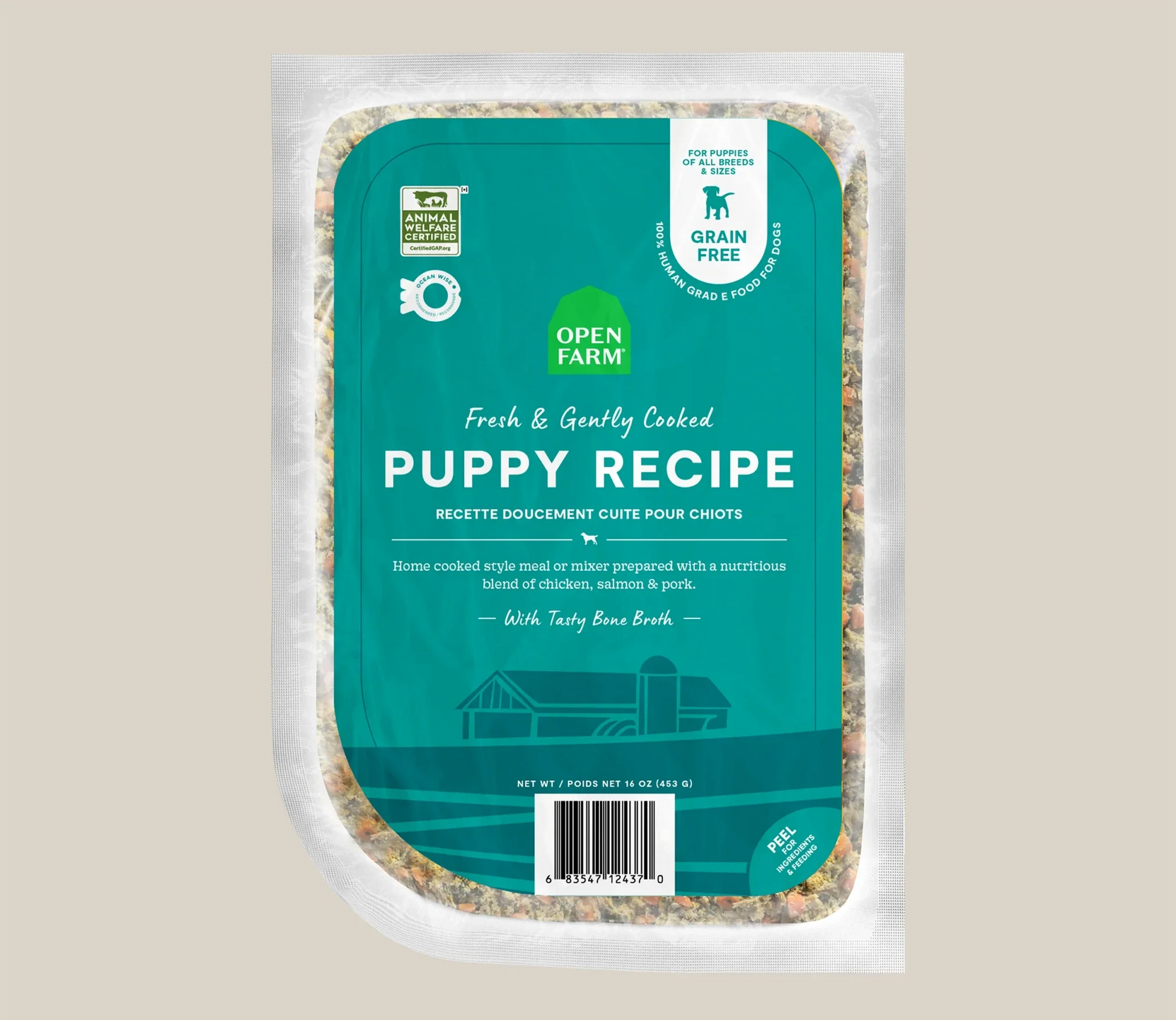 Puppy grain-free freshly cooked dog food with chicken, salmon, pork, and bone broth in a frozen pouch