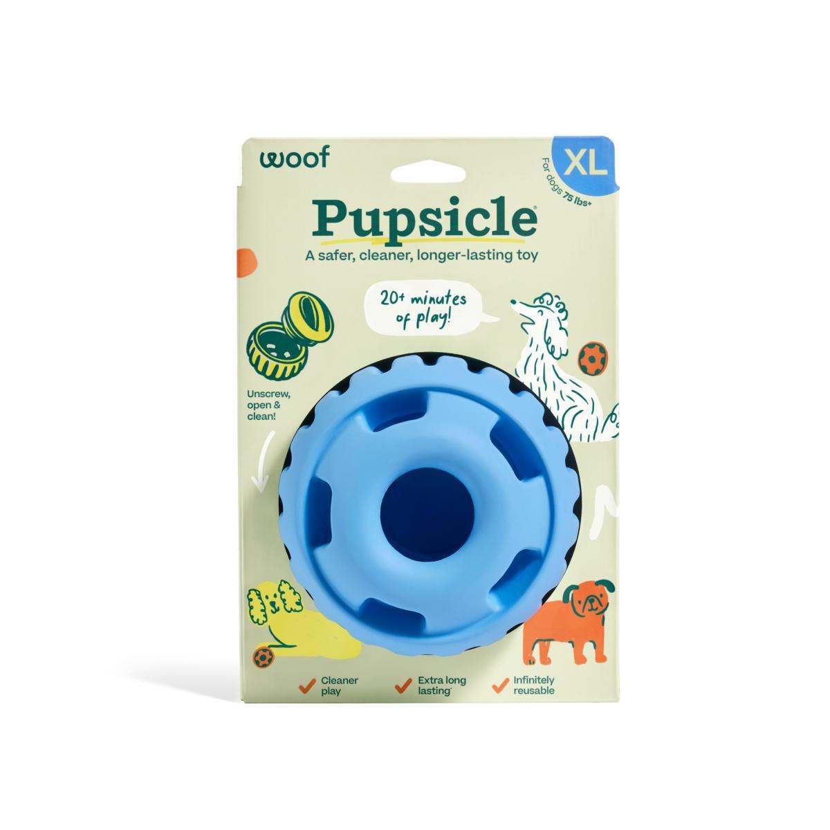 Pupsicle enrichment toy in bright blue rubber, with a round weighted base, central opening and scalloped rim, shown in XL packaging.