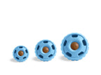 Pupsicle dog enrichment toy in blue rubber, shown in three sizes with a brown treat visible inside each one.