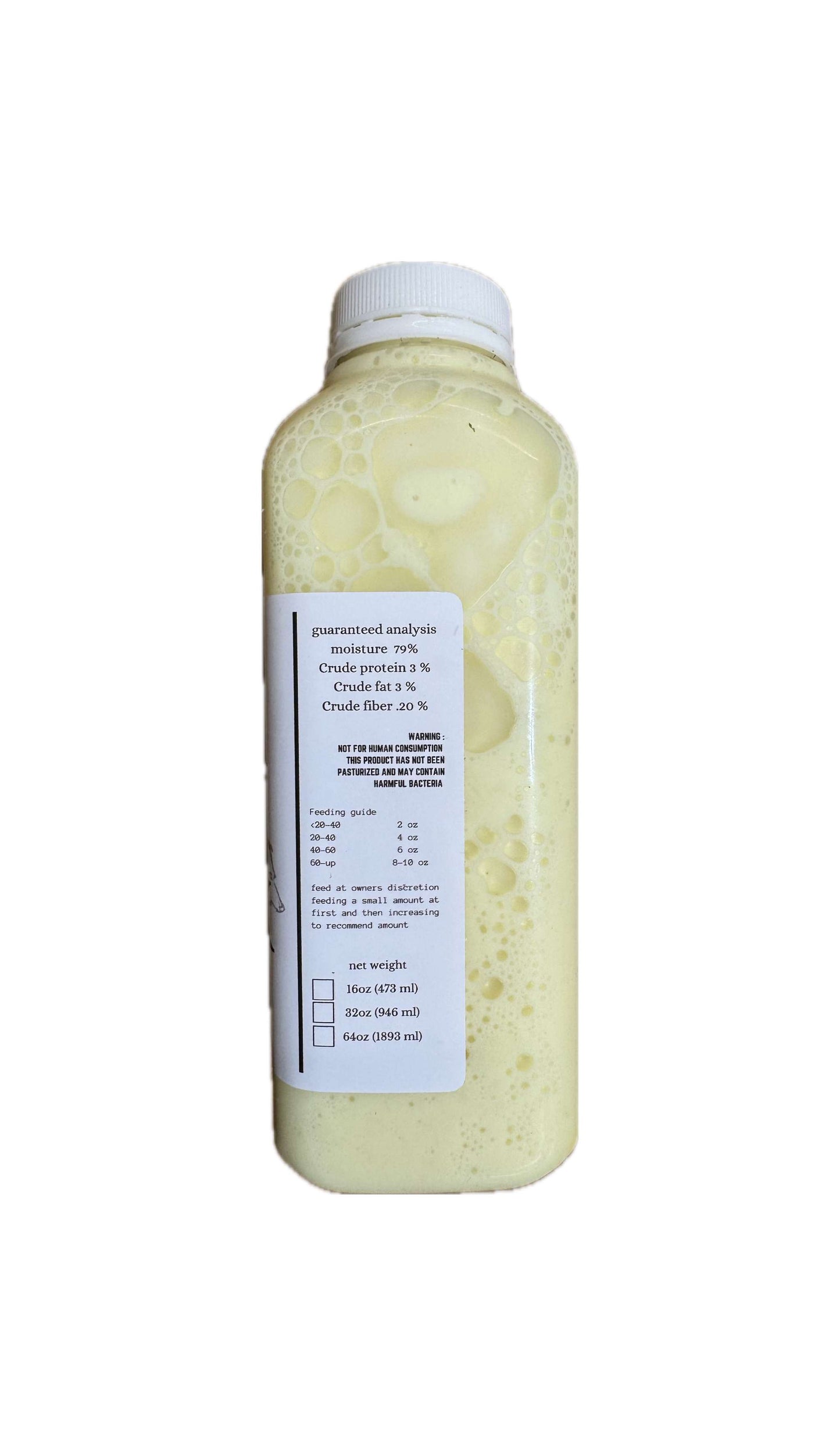 Bottle of raw goat's milk for pets with nutrition label.