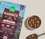 Dog kibble with RawMix Front Range packaging, a white bowl of brown and tan rounded pieces beside it.