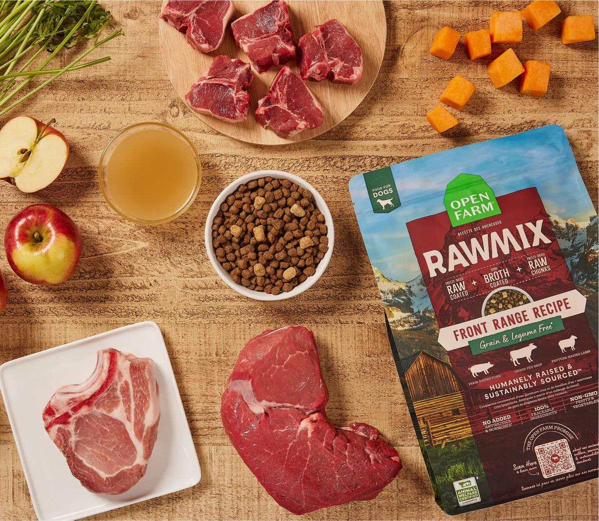 RawMix Front Range grain-free dog kibble with beef, lamb, pork, bone broth, and pumpkin ingredients displayed alongside fresh meat and vegetables