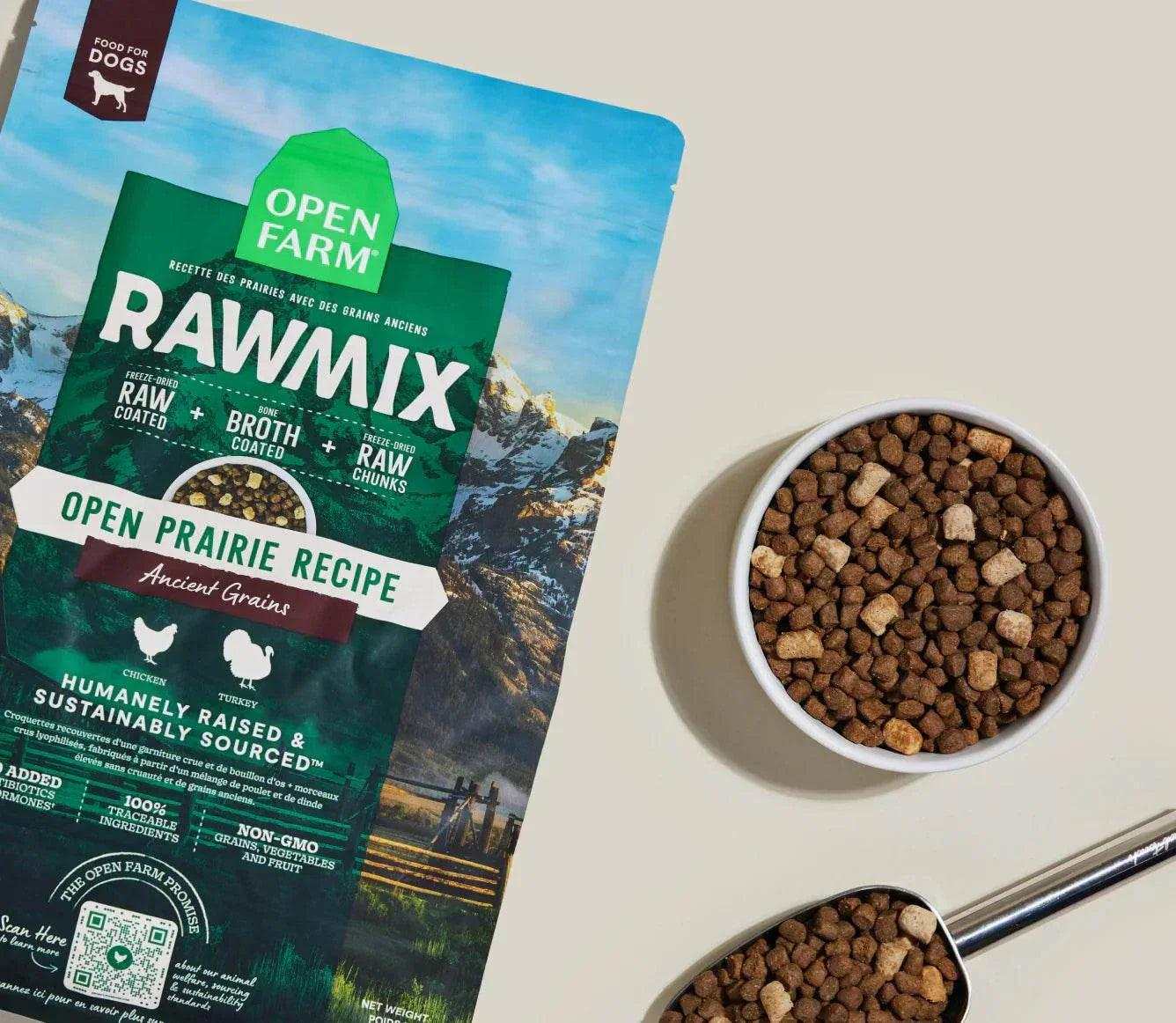 RawMix Open Prairie Ancient Grains dog kibble with chicken broth coating and protein-rich chunks in bowl