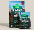 RawMix Open Prairie dog kibble in green bags, featuring mountain and prairie artwork with bold white lettering.