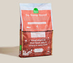Puppy food kibble in a red and white Open Farm bag, with salmon and ancient grains; Puppy Salmon & Ancient Grain Recipe.