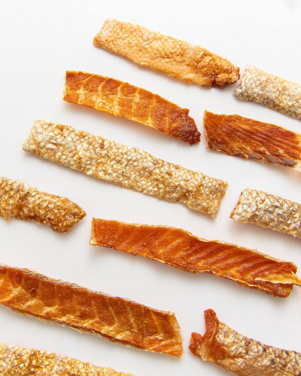 Salmon skin jerky dog treats made from sustainable single-ingredient smoked salmon skins rich in omegas for healthy coat and skin
