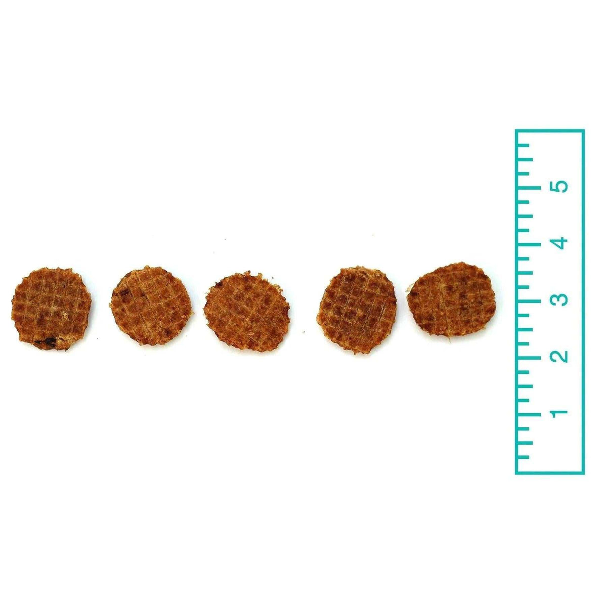 Turkey Flips are small, round, reddish-brown treats with a rough, crumbly texture and uneven edges.