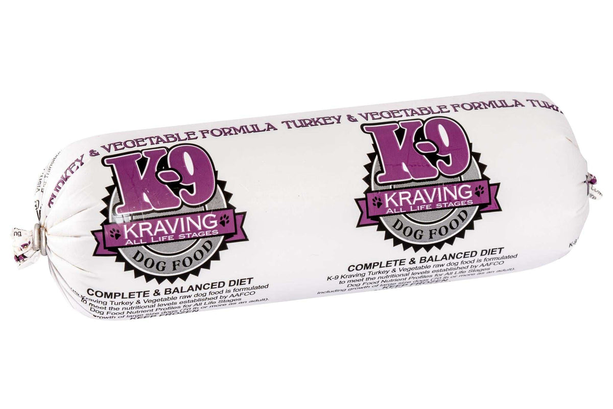 Turkey dog food roll in white plastic packaging with purple K-9 Kraving labels and vegetable formula text