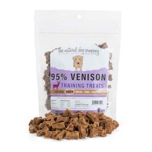 Package of 95% venison training bites dog treats shaped like miniature bones with high meat content for sensitive dogs