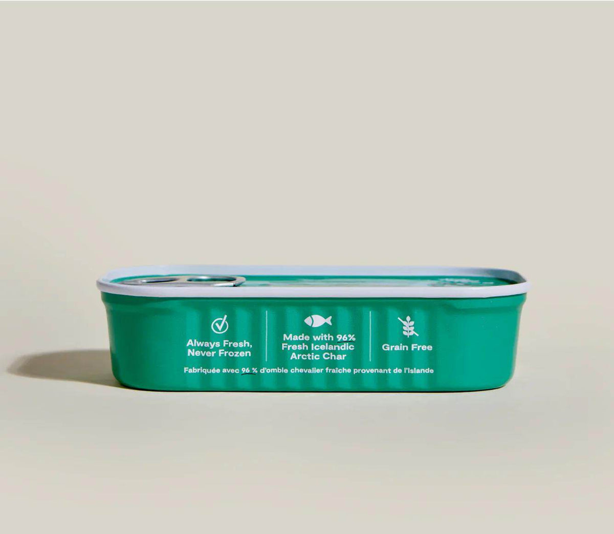 Arctic Char Topper for Dogs in a teal-green can with a silver pull-tab lid and white Icelandic fish icons and text.