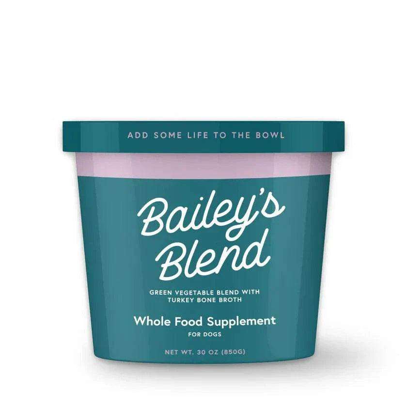 Bailey’s Blend green vegetable blend in teal container with white text, a whole food supplement for dogs with turkey bone broth