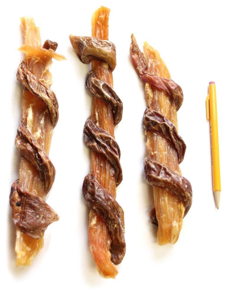 Three Beef Combo Strap dog chews made of beef backstrap and gullet, placed next to a yellow pencil for size comparison