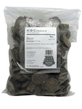 Beef K-9 Cookies in a clear plastic 5-pound bag, showing dark brown, round and irregular baked dog treats.