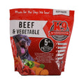 Beef dog food in a red frozen-food bag, labeled beef and vegetable with a dog image and five-pound patties.