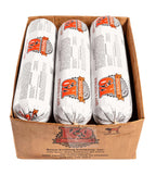 Beef raw dog food in three white plastic-wrapped rolls with orange and black K-9 Kraving labels, packed in a cardboard box.