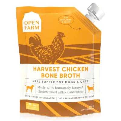 Chicken Bone Broth in an orange and brown carton, with a rooster illustration, white screw cap, and chicken labeling.