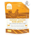 Chicken Bone Broth in an orange and brown carton, with a rooster illustration, white screw cap, and chicken labeling.