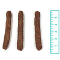 Three 5-inch Bully Snaps beef chew sticks next to a ruler showing their length