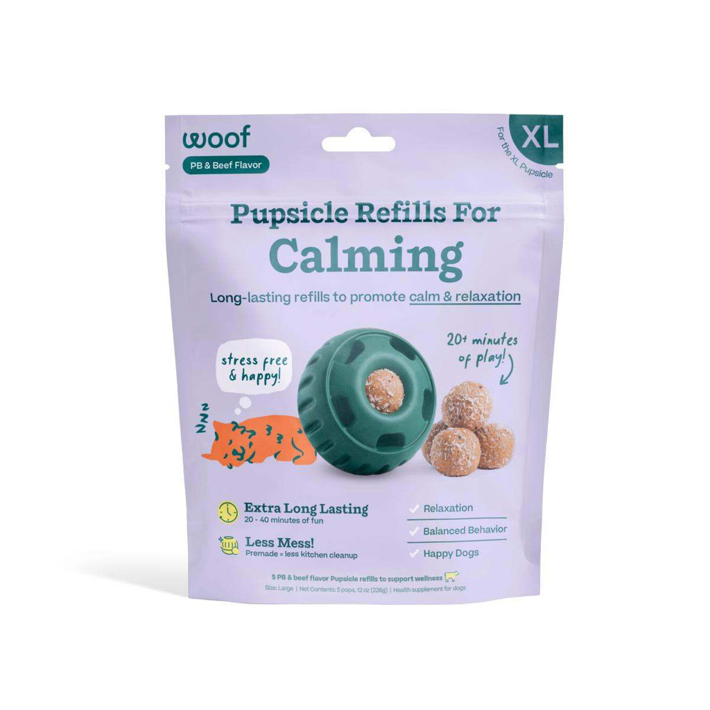 Calming Vitamin Pops appear as lavender refill packaging with teal text, a teal toy and tan round treats pictured.