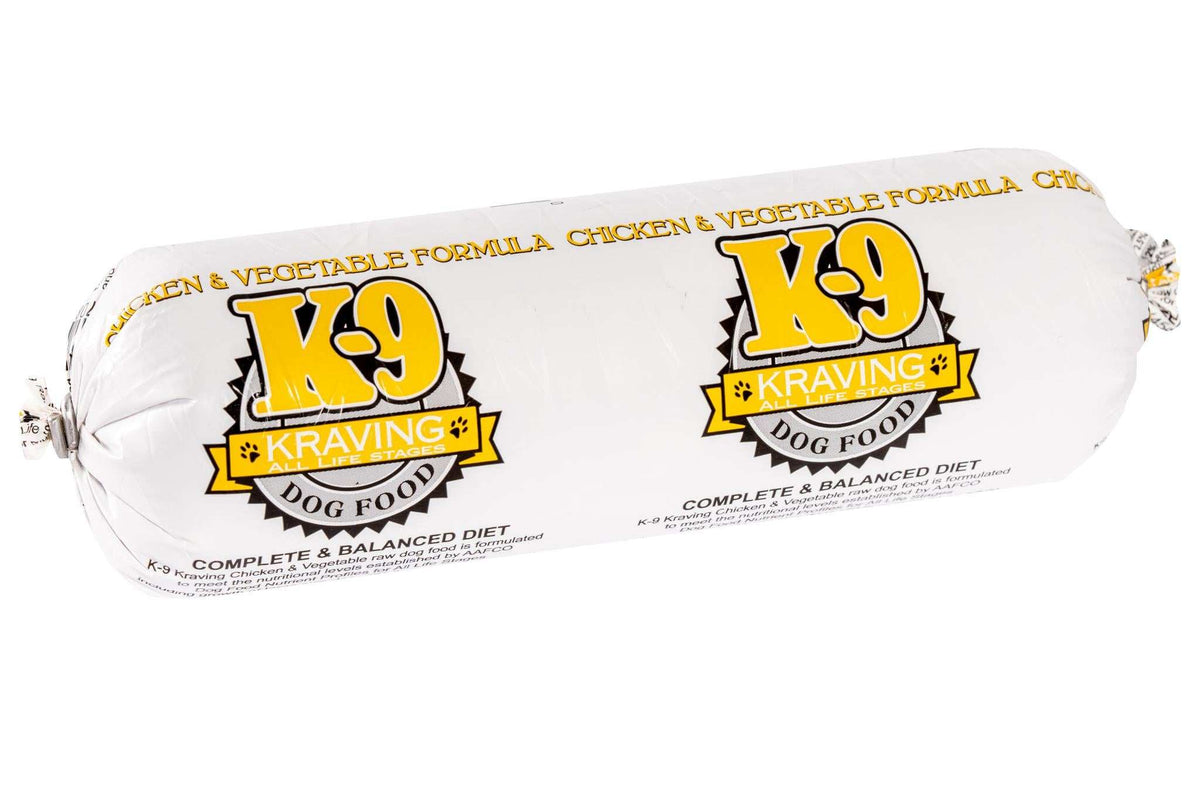 Raw dog food, white plastic package with yellow and black K-9 Kraving logos and chicken and vegetable formula text.