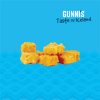 Small yellow Cod Baby Bites dog treat pieces shown on a blue background.