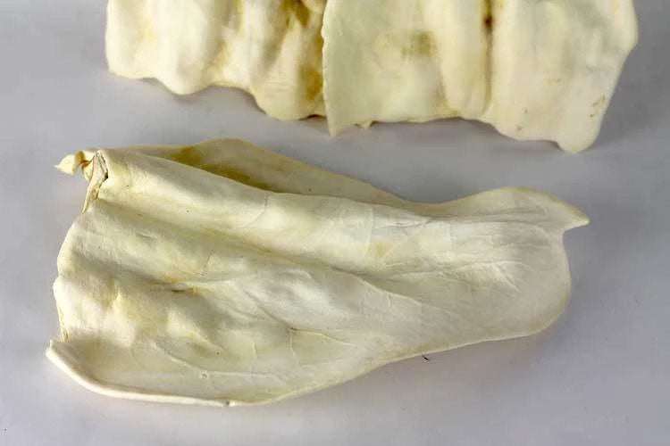Natural cow ears dog chew, 5-6 inches long, soft and chewy, suitable for all dog sizes and life stages