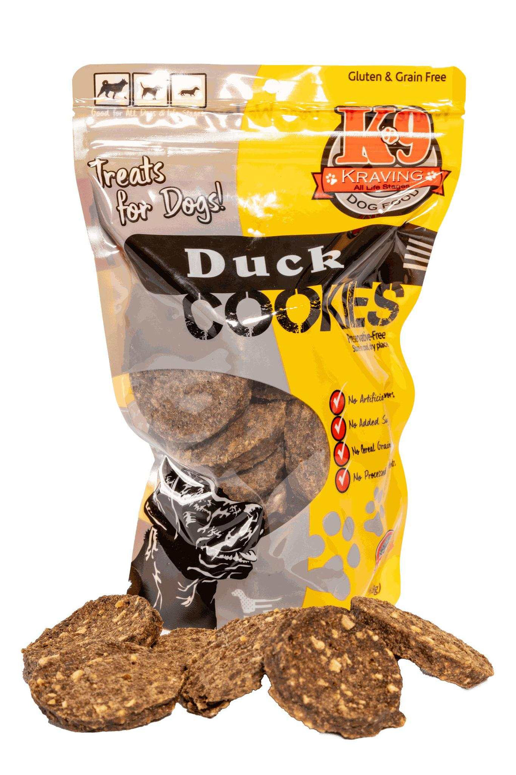 Duck dog cookies in a yellow and clear plastic pouch, with rough round brown treats visible through the package and in front.