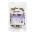 Duck Training Bites in a clear resealable pouch, showing brown bite-sized treats and a purple-and-white label.