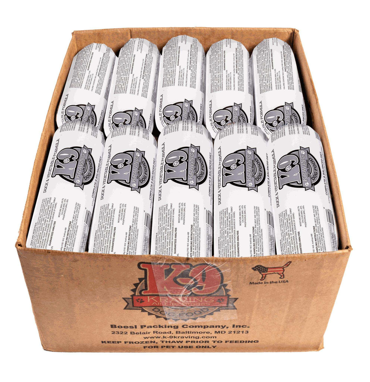 Duck raw dog food rolls in white printed wrappers, packed upright in a brown cardboard box with K-9 branding.