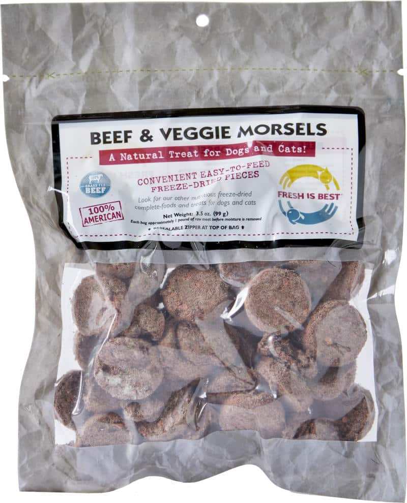 Freeze Dried Beef & Veggie Morsels in a clear, resealable plastic bag featuring round, brown freeze-dried treat pieces visible inside.