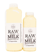 Raw Goat Milk in two clear plastic bottles with cream liquid, white labels, and bold black lettering.
