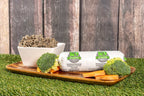K-9 Kraving Green Tripe with fresh vegetables on a wooden tray.