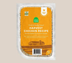 Harvest Chicken Grain-Free dog food in a sealed clear pouch, with an orange label and gently cooked chicken recipe.