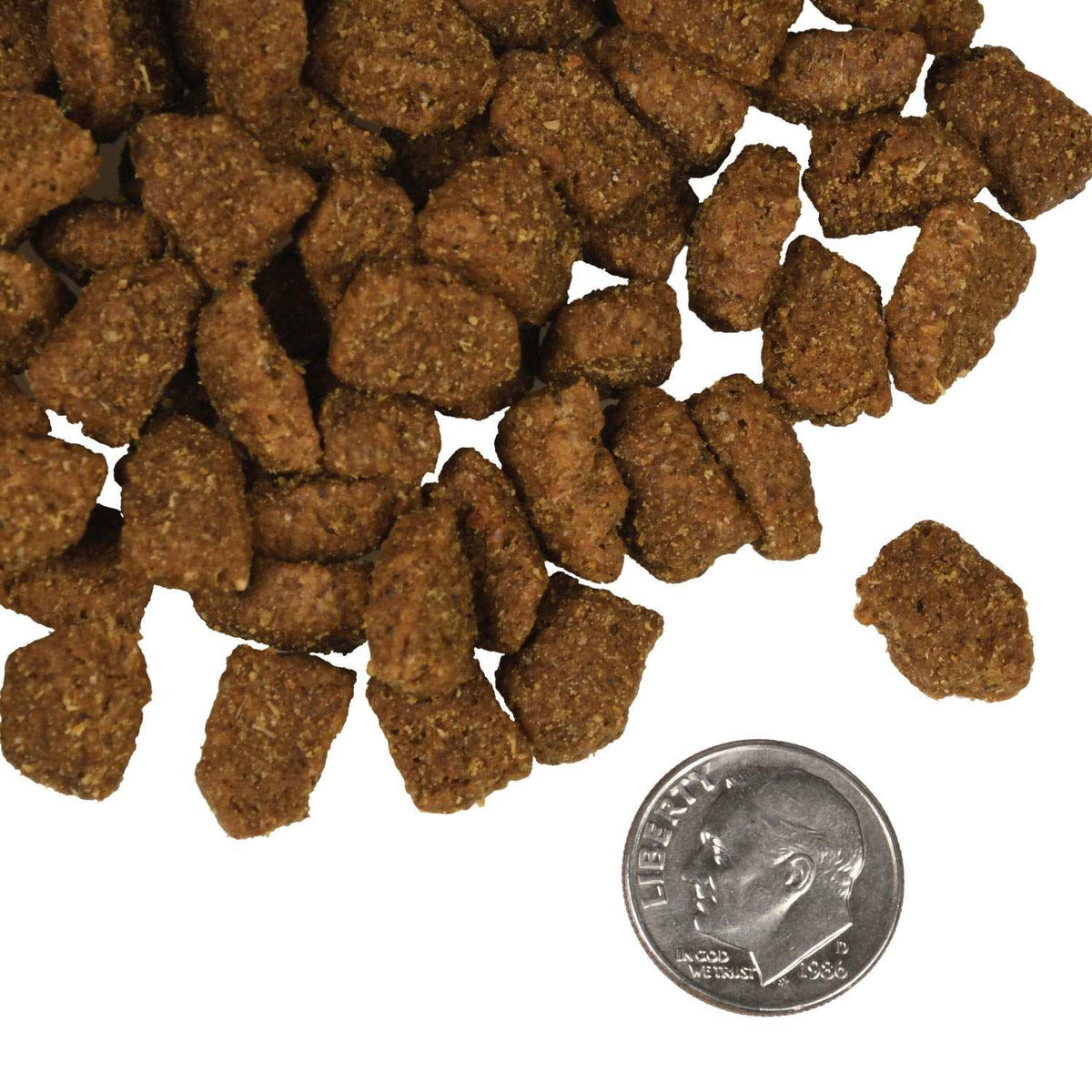 Dry dog food kibble with coarse, irregular brown pieces, featuring a crunchy texture; -Star Beef Oats & Barley recipe.