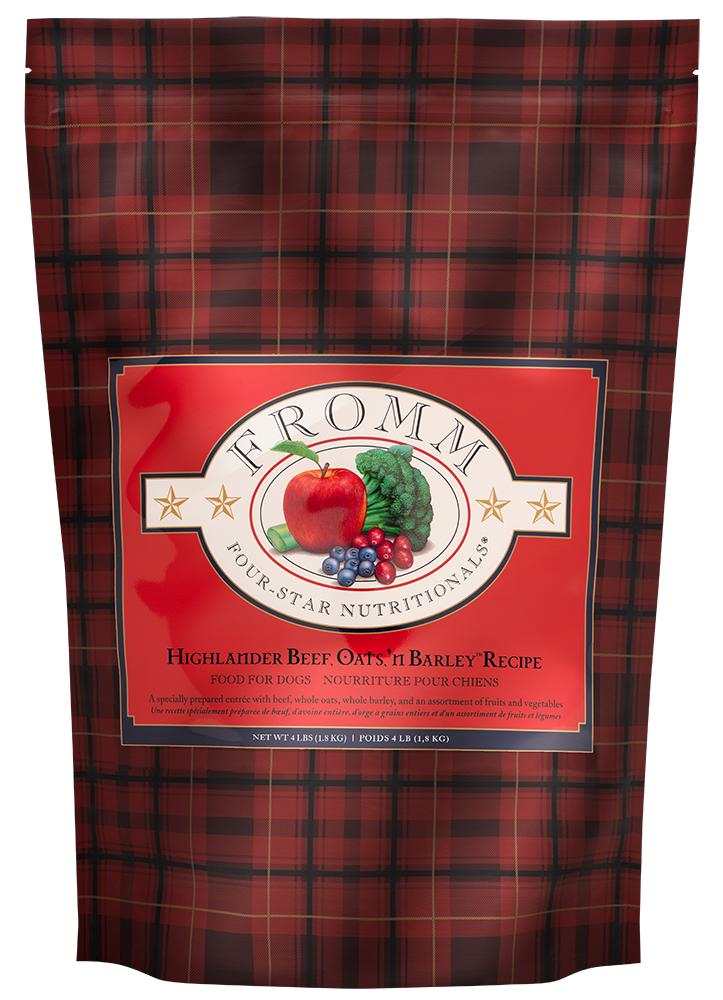 Dog food bag with red and black tartan pattern featuring a red label with fruit and vegetable illustration for Four-Star Beef Oats & Barley recipe.