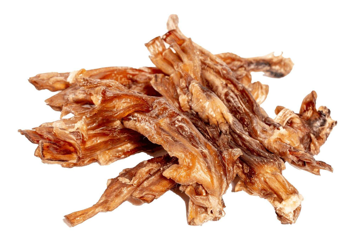 Dried beef tendon chews in natural brown hues with fibrous texture, naturally tough and collagen-rich Jr. Chews for dogs.