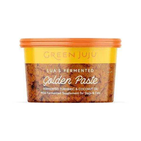 Lua's Golden Paste fermented turmeric and coconut oil paste in an orange-lidded, yellow and amber container for pets.