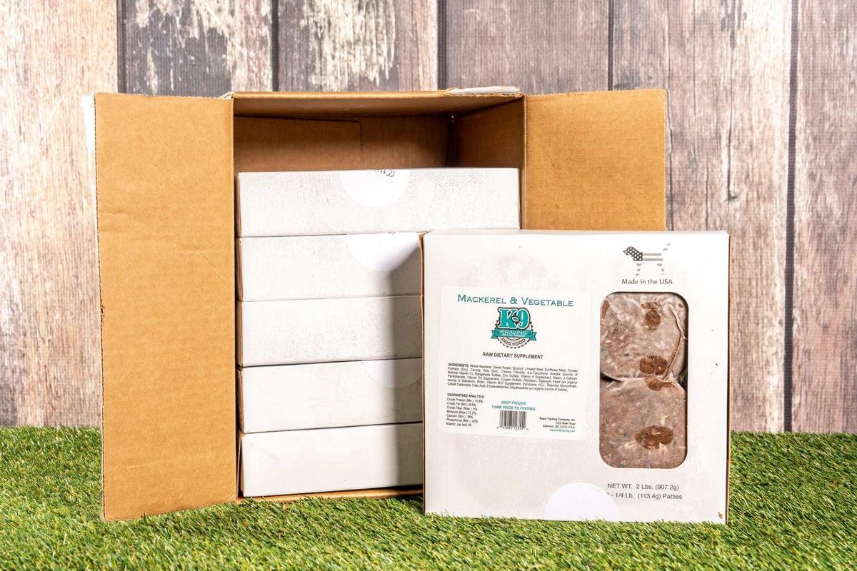Mackerel & Vegetable Formula Raw Dog Food package on grass background.